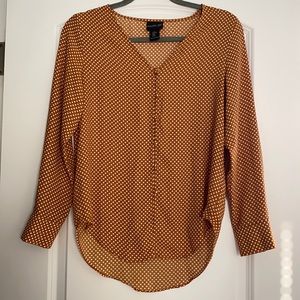 Burnt orange polka dot blouse